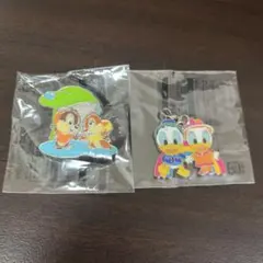 新品◇雨の日限定 ピンバッチとキーチャームセットジャングルカーニバル ディズニー