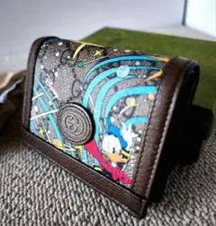 グッチ&ディズニーコラボ！ドナルドダックの二つ折り財布 GUCCI Disney