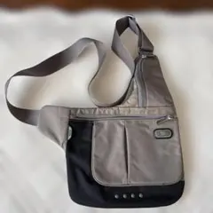 TUMI ボディバッグ ショルダーバッグ グレーのサムネイル