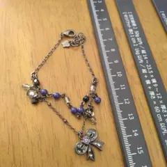 ANNA SUIリボンチャーム付き紫色ビーズブレスレット