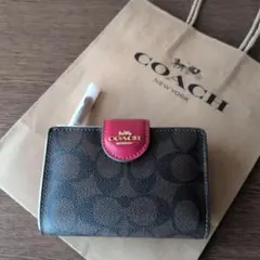 ［新品未使用］COACH 二つ折り財布 ブラウン/レッ ドシグネチャー
