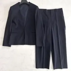 さ*く様 美品 ノーカラーパンツスーツ 洗えるセットアップ 紺 ネイビー M ワ
