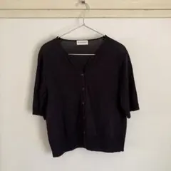 ヒューマンウーマンの濃紺のトップス