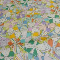 リボン柄の綿プリント生地 110×30