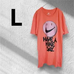 ナイキNike Smiley Face TシャツコーラルLサイズ　ピンクオレンジ