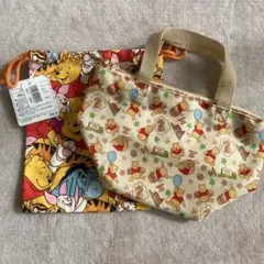 新品未使用くまのプーさん ポーチと巾着セット