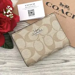 新品未使用 】COACH コーチ 二つ折り財布 猫 シグネチャー CC922