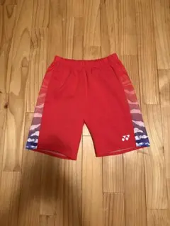 YONEX ハーフパンツ レッド 幾何学模様 Oサイズ - メルカリ