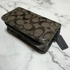 COACH コーチ メイクポーチ 小物入れ シグネチャー ポーチ ブラウンのサムネイル