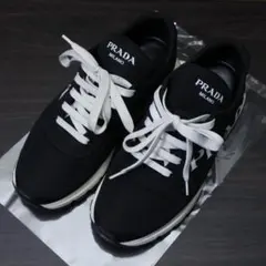 【匿名配送】PRADA プラダ スニーカー ロゴ ブラック ホワイト 7 1/2のサムネイル