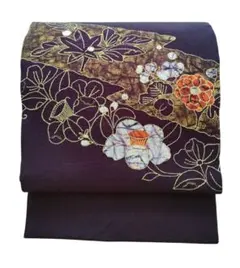 名古屋帯　名古屋仕立て　お太鼓柄　縮緬　濃い紫　ろうけつ染め　草花文様