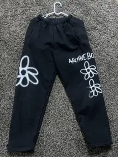 ARCHIVE BOLD 939° ブラック 花柄プリント スエットパンツ