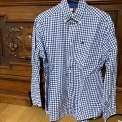 トミーヒィルガーのブルーのギンガムチェックのボタンダウンの出品です。
