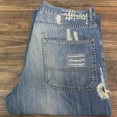 中古 90s OLD STUSSY ダメージ&リペア加工 デニムパンツのサムネイル