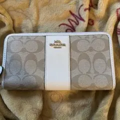 COACH シグネチャー ラウンドファスナー 長財布のサムネイル