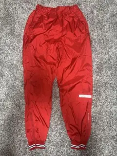 90s Champion ナイロンパンツ 裏 アルミ加工 裾ジップ付き 赤のサムネイル