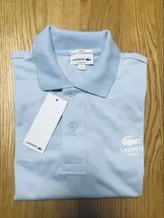 LACOSTE 水色 ポロシャツ 新品タグ付きユニセックス。薄い汚れがあり