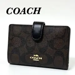 【美品】COACH 二つ折り財布 シグネチャー ブラウン　コンパクトウォレットのサムネイル