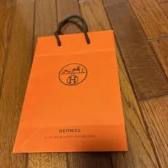 HERMES オレンジショップ袋 小型
