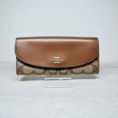COACH 二つ折り財布 シグネチャー柄×ブラウン