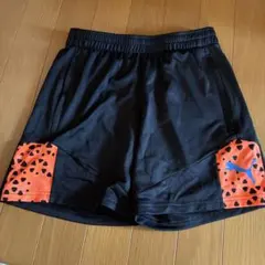 PUMA ハーフパンツ 黒/オレンジ 160