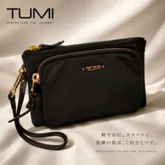 TUMI トゥミ ポーチ 黒 ゴールド金具 未使用級のサムネイル