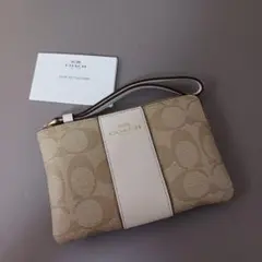 262/未使用 COACHコーチ コーナージップリストレットポーチ シグネチャーのサムネイル