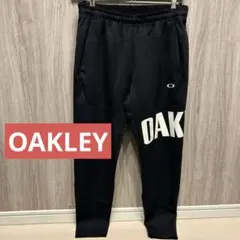【大人気】OAKLEY ゴルフウェア スウェットパンツネイビー デカロゴ 古着L