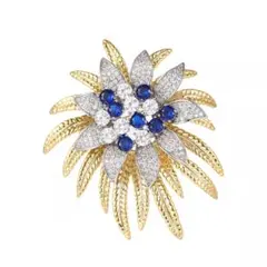 花形ブローチ 金色メッキ 青いストーン