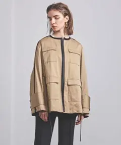 CINOH【ノーカラーパイピングジャケット】