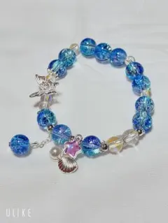 ビーズブレスレット　貝殻と蝶々のチャーム付き