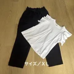 ホワイトフリル袖Tシャツとネイビーパンツセット