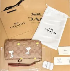 超人気COACH x PEANUTS コラボスヌーピー長財布 CE705のサムネイル