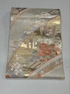美しい花柄の金色袋帯