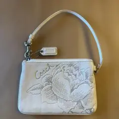 Coach 花柄エンボス ポーチ ホワイト