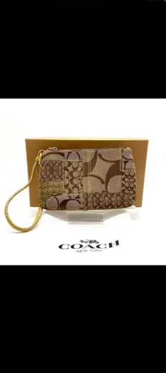 COACH パターンポーチ ブラウン系