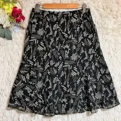 【ラガーフェルド】(M)ひざ丈フレアスカート総柄ドット柄ブラックホワイト通勤用のサムネイル