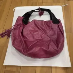 ピンク レザー ショルダーバッグ タッセル付き