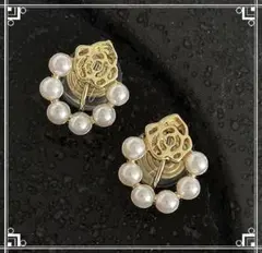 イヤリング　ゴールド花モチーフ　パール　耳が痛くなりにくい　ミニ巾着付き