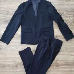 ウォッシャブルノーカラージャケット、テーパードパンツ セットアップ 　ブラック