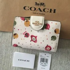 美品】COACH コーチ 猫 ダンシングキトゥン 二つ折り財布 ホワイト