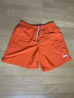 STUSSY ステューシー ナイロンショーツ オレンジ Mのサムネイル