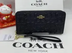 COACH ブラック 長財布 型押しデザイン