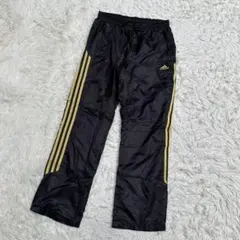 adidas アディダス CLIMAPROOF ナイロン パンツ 黒金 3本線のサムネイル