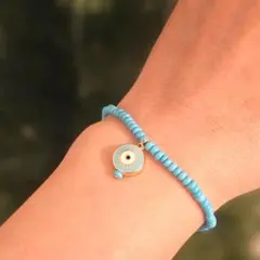 ターコイズブルー ビーズブレスレット 目のチャーム付き
