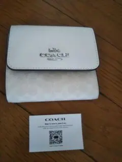 COACH コーチ 三つ折り財布 ホワイト シグネチャーのサムネイル