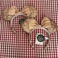 新品タグ付 ディズニー　ミニーピンクゴールドスパンコールカチューシャ　２点セット
