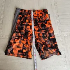 UNDER ARMOUR ハーフパンツ YLG オレンジ・黒