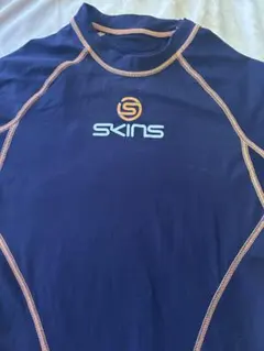 ⭕️即購入 Mサイズ SKINS オレンジ ウェアのサムネイル