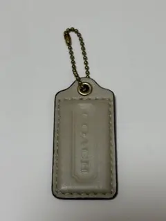 美品・希少】COACH レザー チャーム ホワイト - メルカリ
